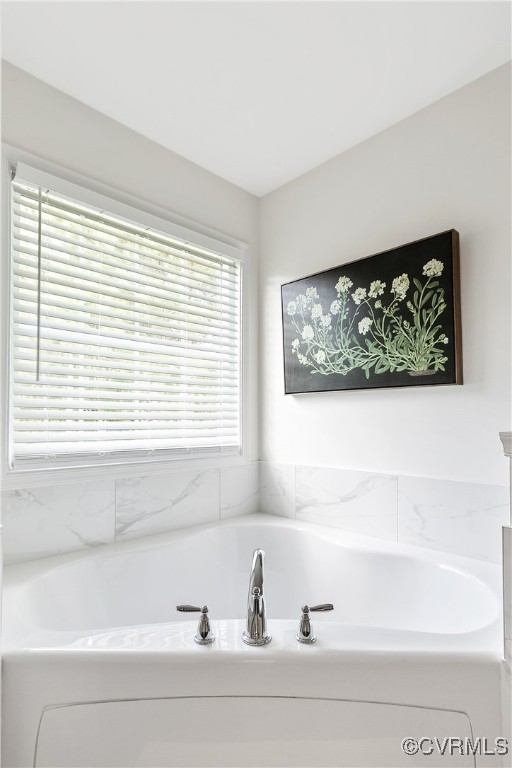 11506 Avening Road Midlothian, VA 23112 - Photo 36 of 50 a bathroom with a bathtub and window