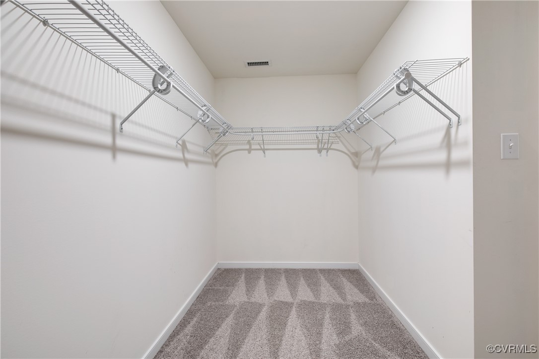 11506 Avening Road Midlothian, VA 23112 - Photo 38 of 50 a view of a room with racks on the wall