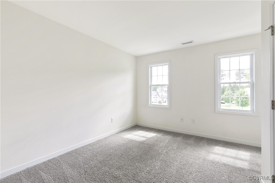 11506 Avening Road Midlothian, VA 23112 - Photo 39 of 50 an empty room with windows