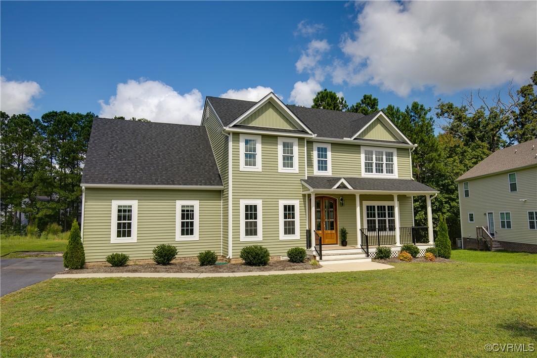 11506 Avening Road Midlothian, VA 23112 - Photo 4 of 50 front view of a house with a yard