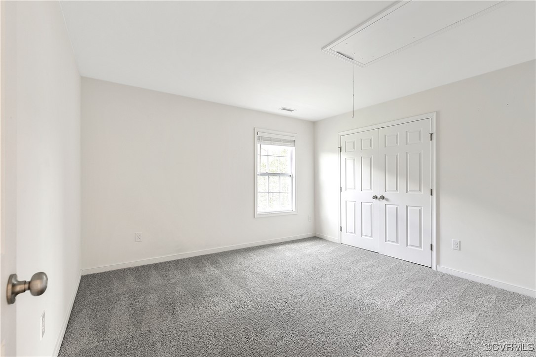 11506 Avening Road Midlothian, VA 23112 - Photo 41 of 50 a view of an empty room with a window