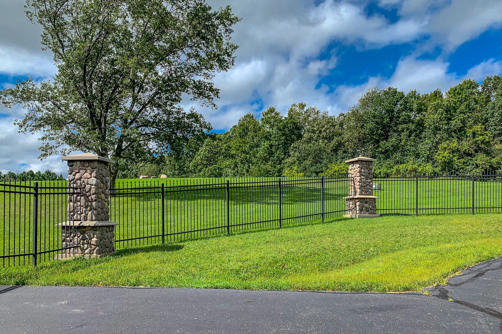 Lt24 Trinity Lane Geneva, WI 53147 - Photo 11 of 29 Quality Fencing with Stone Pillars