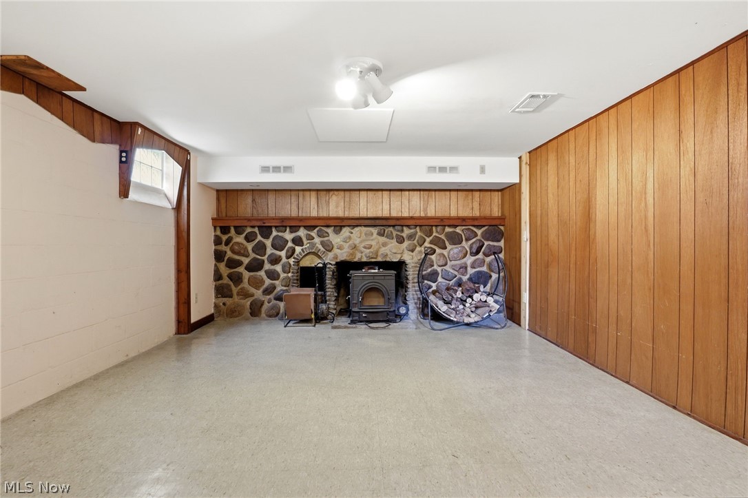 8977 Cedar Road Chesterland, OH 44026 - Photo 34 of 50 Stone accented fireplace