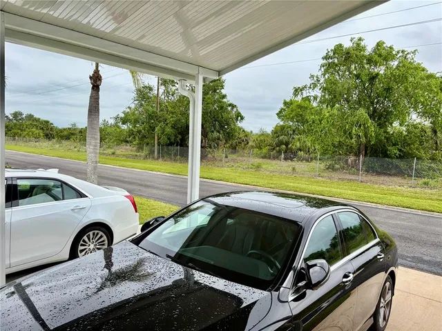 a car parked in front of a house