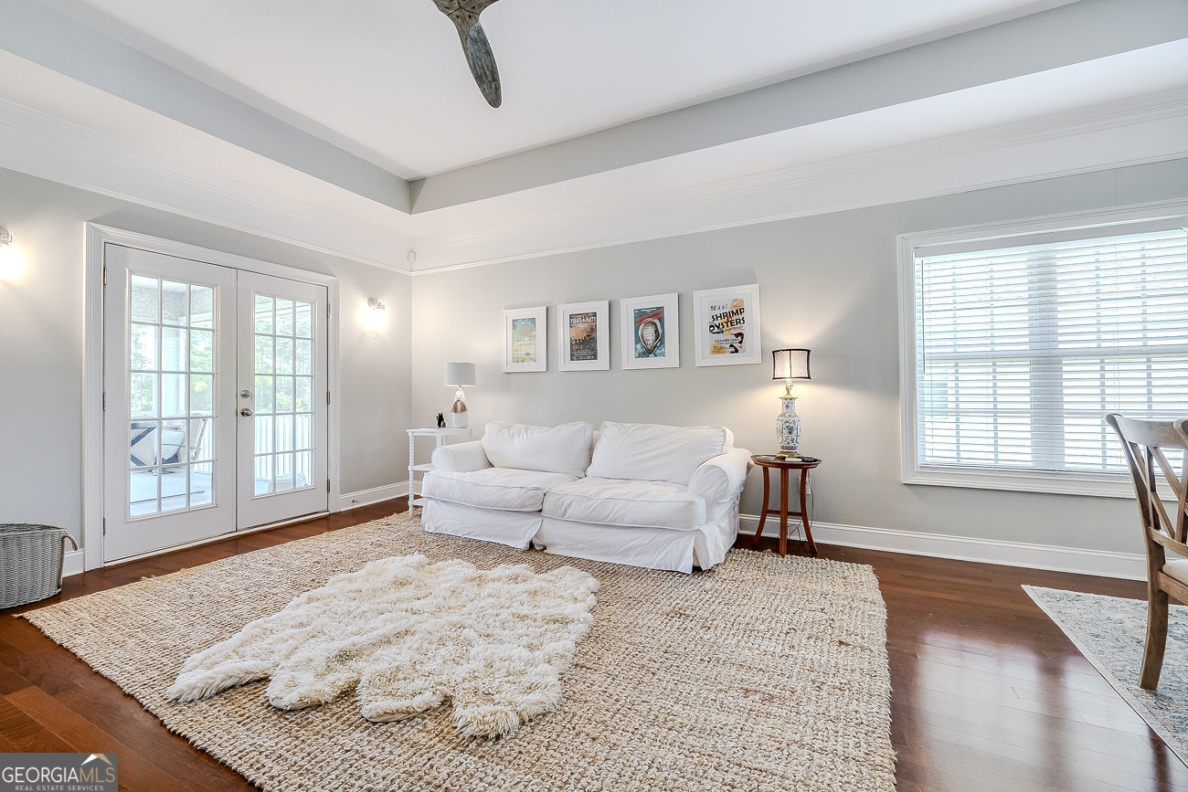 7272 Shellman Bluff Road Northeast, Unit 18 Townsend, GA 31331 - Photo 5 of 31 a living room with furniture and a window