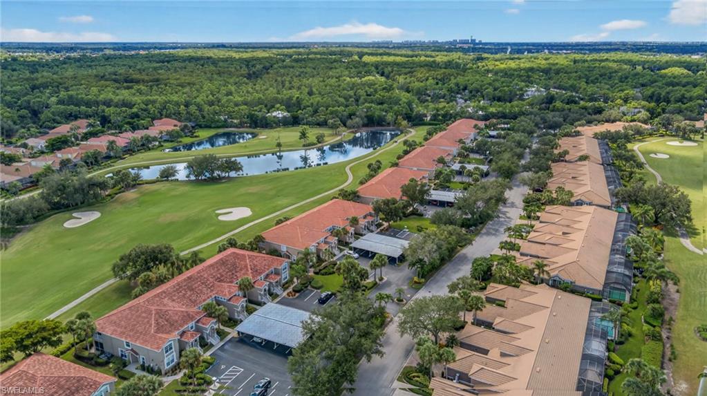 9020 Spring Run Boulevard, Unit 602 Estero, FL 34135 - Photo 29 of 47 Long aerial view of Streamside Condos and Sabal Cove Villas in Spring Run at the Brooks