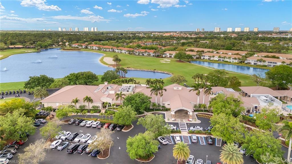 9020 Spring Run Boulevard, Unit 602 Estero, FL 34135 - Photo 38 of 47 Spring Run Golf Club and western coastal skyline