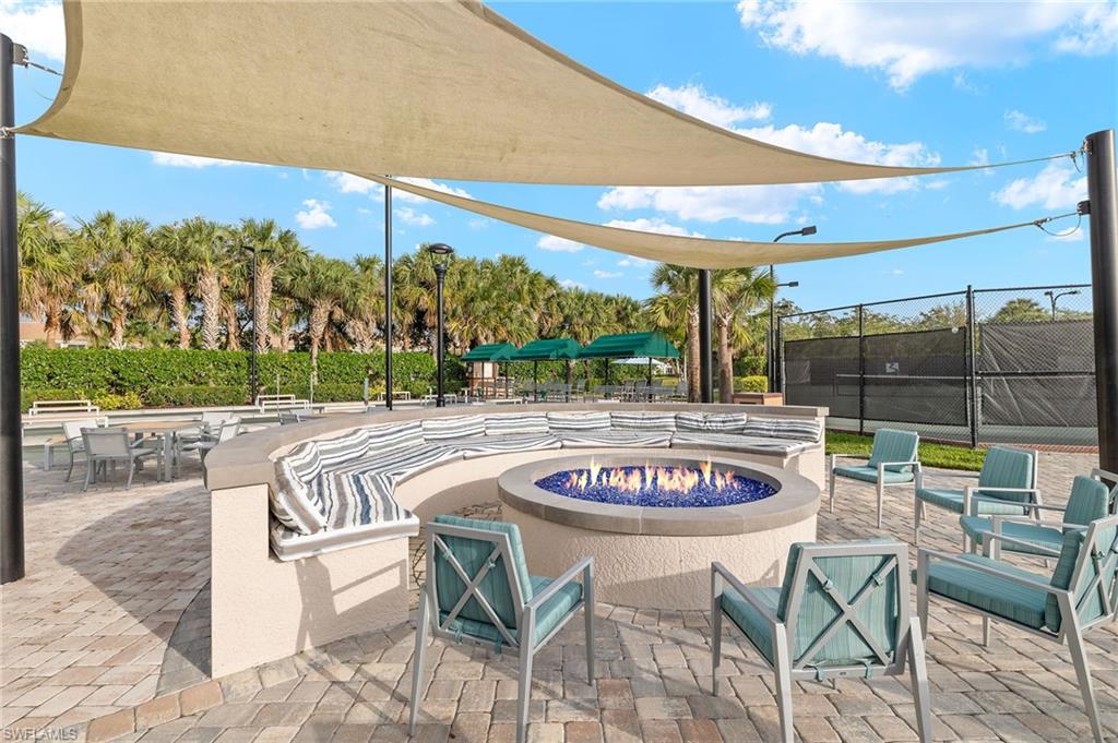 9020 Spring Run Boulevard, Unit 602 Estero, FL 34135 - Photo 45 of 47 One of multiple fire pits for gathering with friends and neighbors