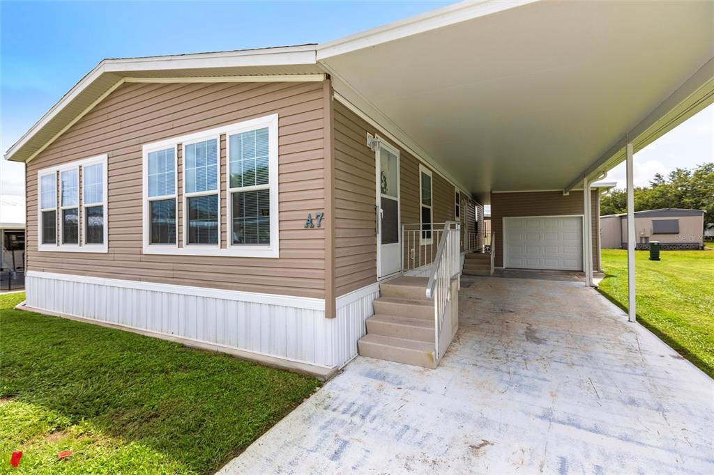 room for two vehicles under carport