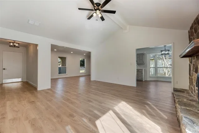 a view of livingroom with hardwood floor and a ceiling fan