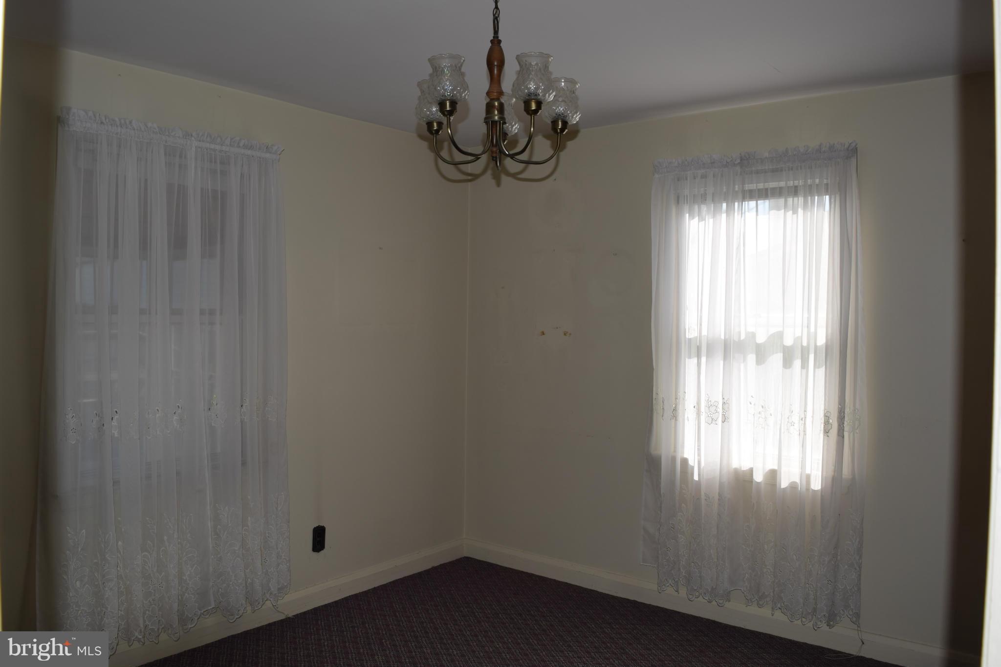 1529 Leslie Road Baltimore, MD 21222 - Photo 8 of 23 a window in an empty room