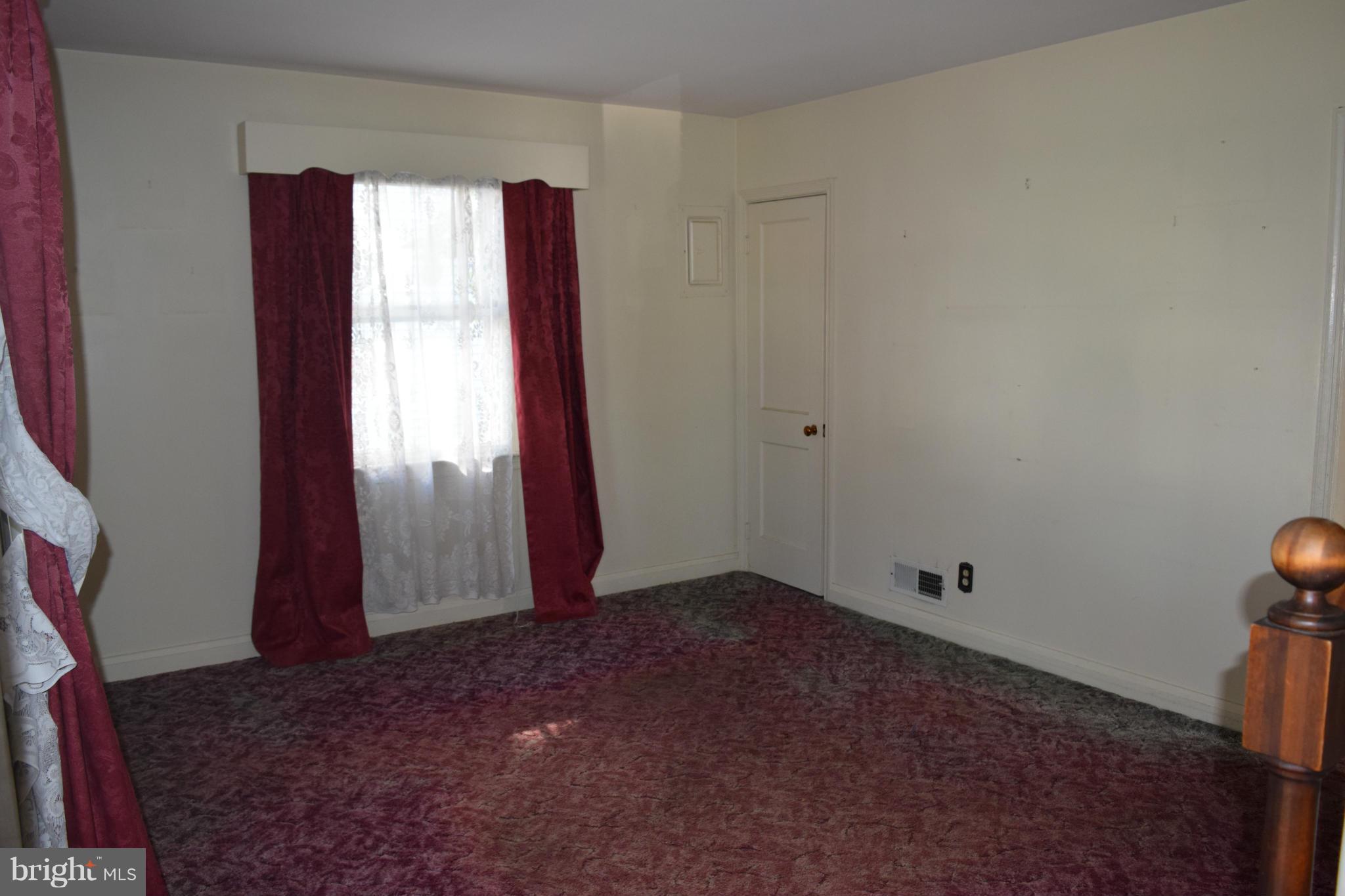 1529 Leslie Road Baltimore, MD 21222 - Photo 9 of 23 a view of an empty room and window