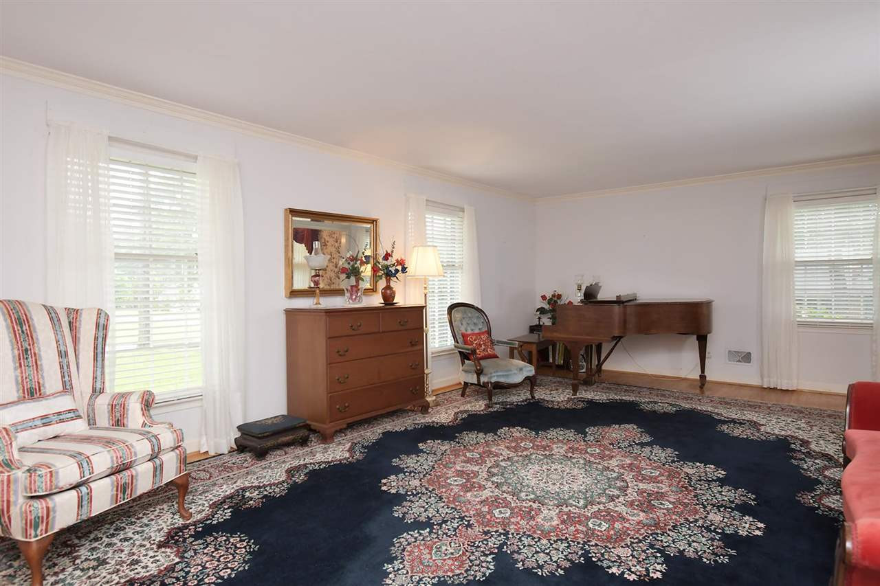 505 South Hollybrook Road Wendell, NC 27591 - Photo 5 of 24 Use your imagination ...this room has many possibilities instead of using it as a formal room. Formal Living Room