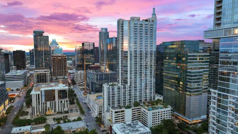a view of a city with tall buildings