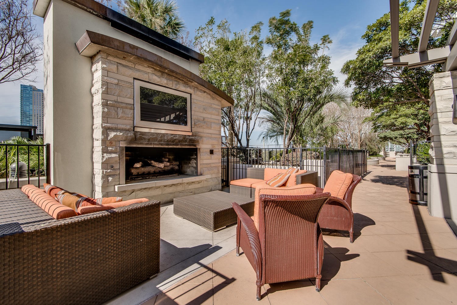 360 Nueces Street, Unit 3608 Austin, TX 78701 - Photo 33 of 40 a outdoor space with patio furniture and a fireplace