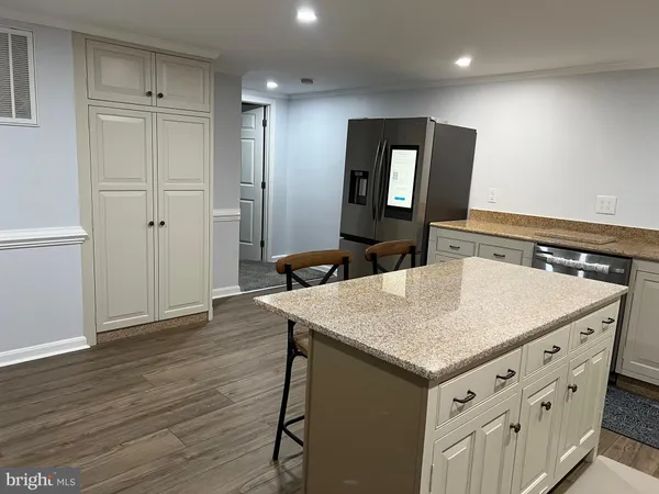 a bathroom with a sink a vanity and mirror