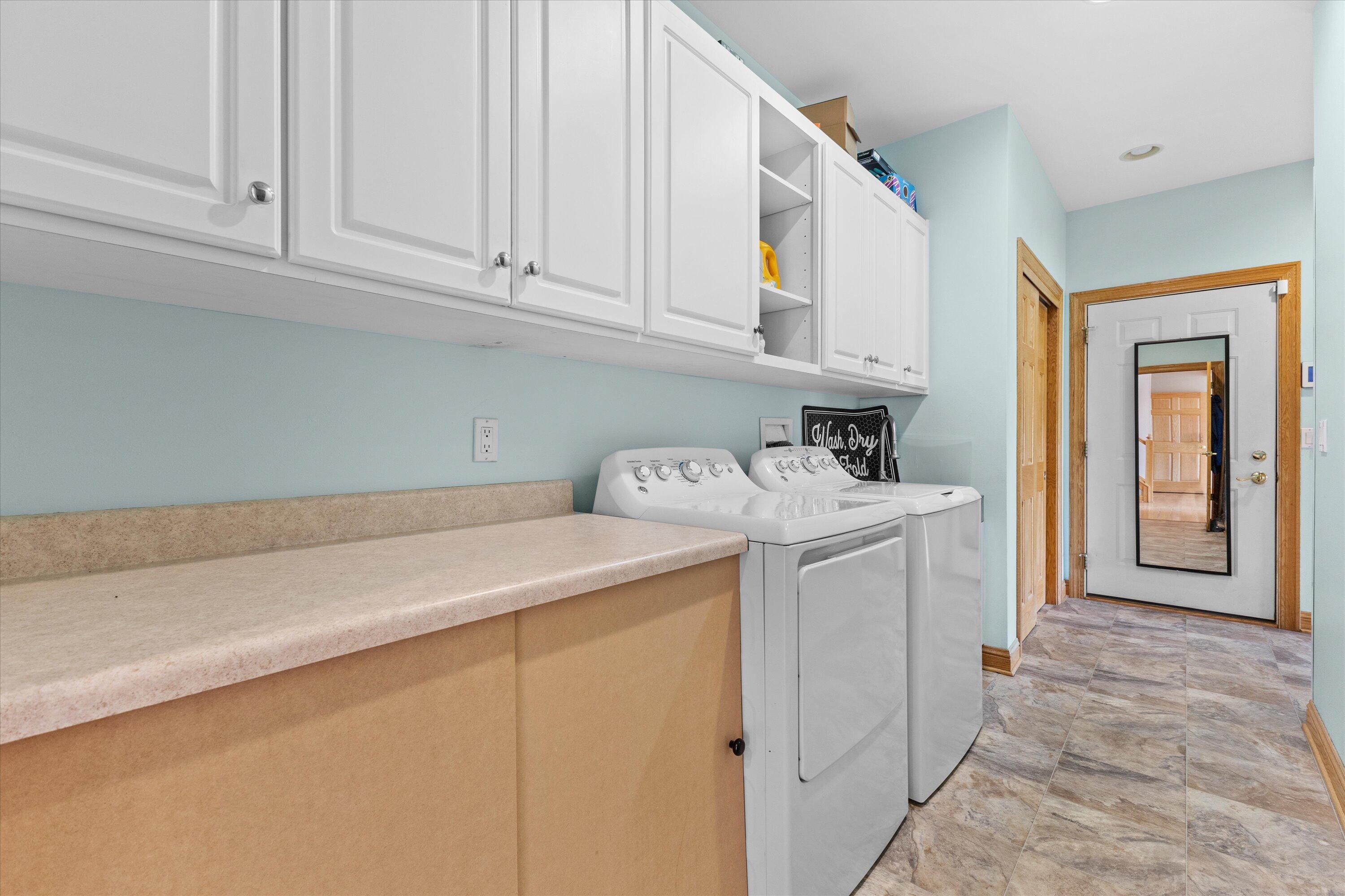 1218 5 Mile Road Caledonia, WI 53402 - Photo 42 of 48 Spacious Laundry Room
