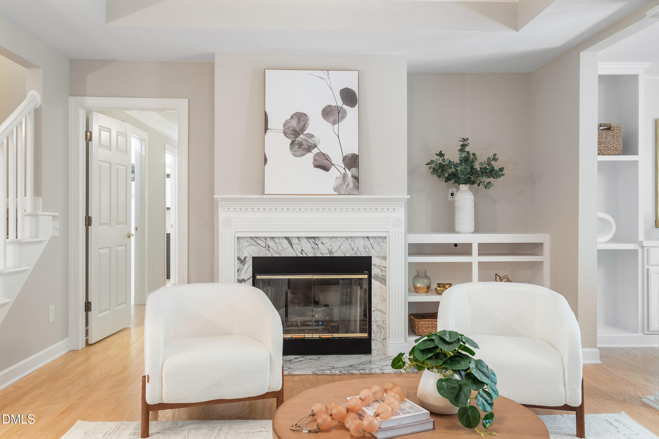 4724 Ludwell Branch Court Raleigh, NC 27612 - Photo 22 of 72 a living room with furniture and a fireplace