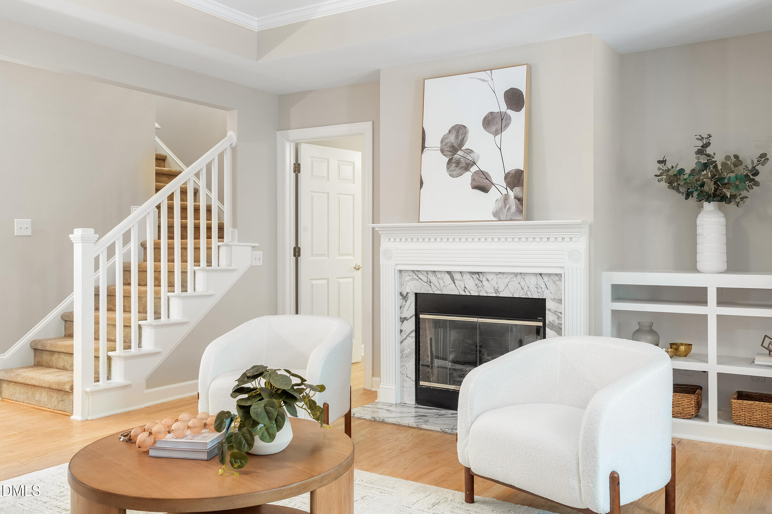 4724 Ludwell Branch Court Raleigh, NC 27612 - Photo 23 of 72 a living room with furniture and a fireplace