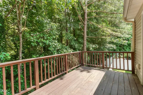 a bed room with a bed and a window
