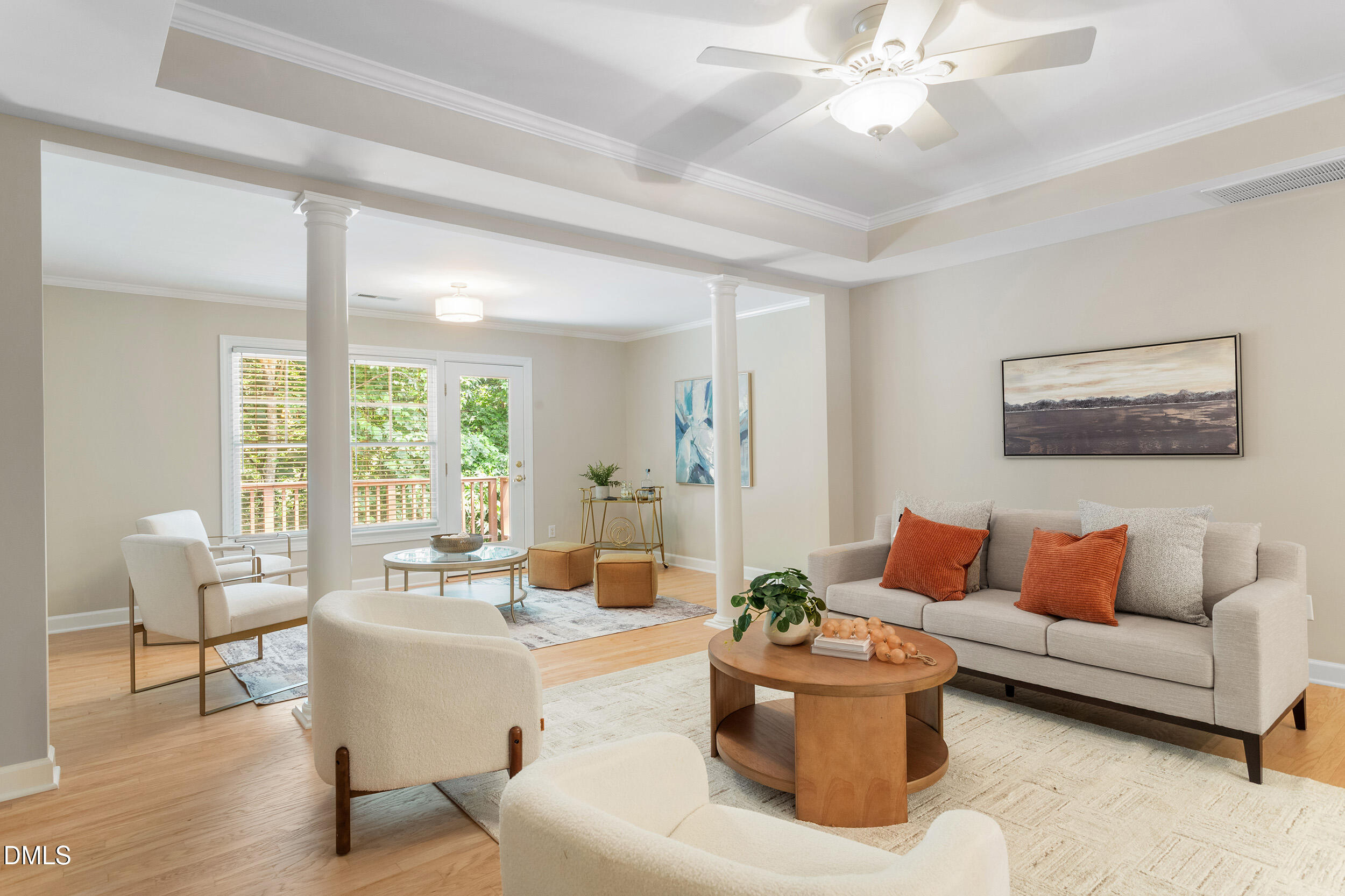 4724 Ludwell Branch Court Raleigh, NC 27612 - Photo 32 of 72 a living room with furniture and a large window