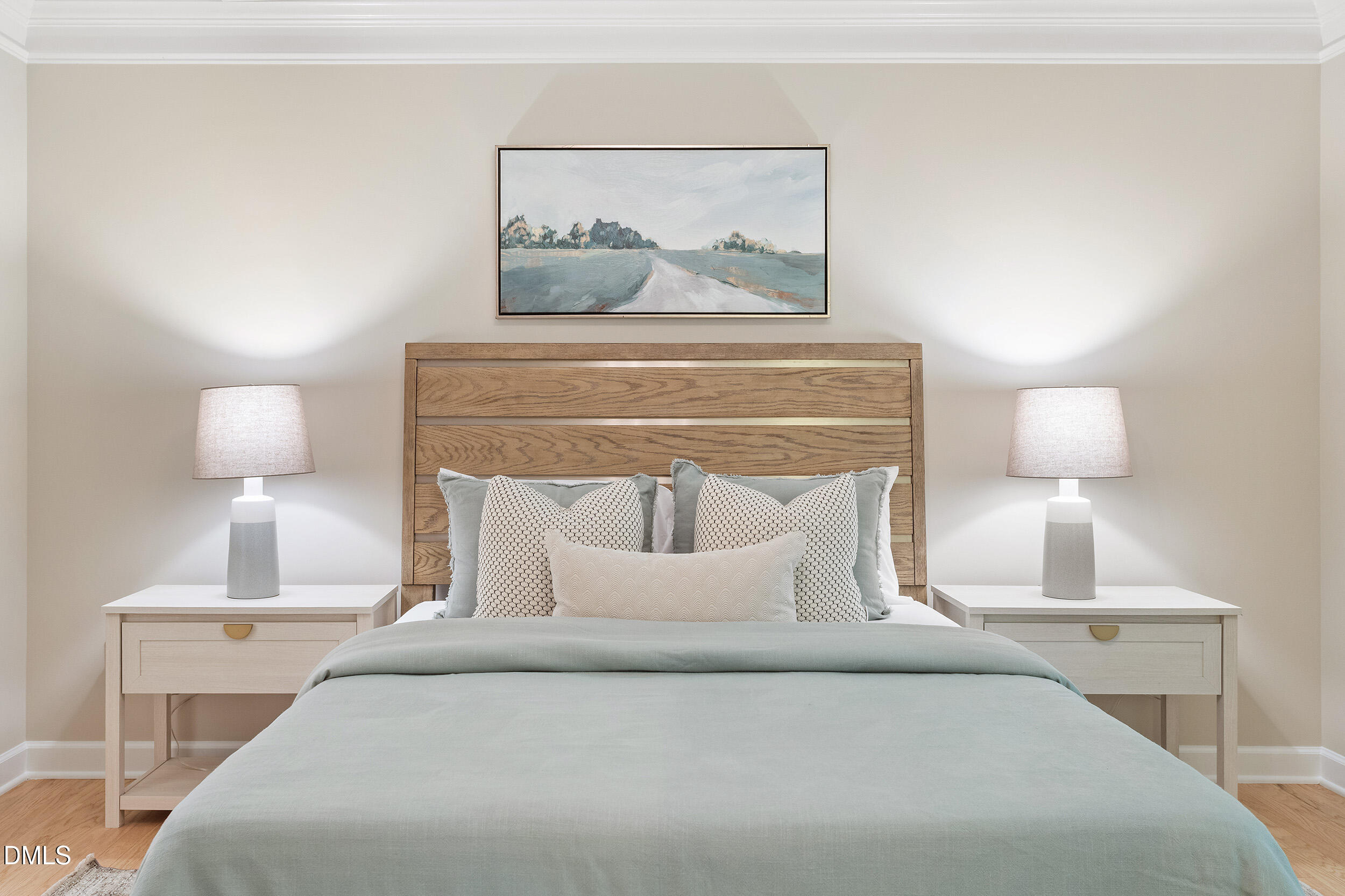 4724 Ludwell Branch Court Raleigh, NC 27612 - Photo 35 of 72 a bed with a white comforter pillows and a chair