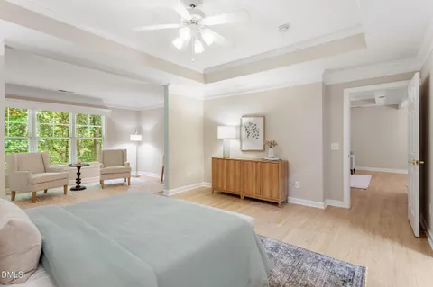 a view of an empty room with a fan