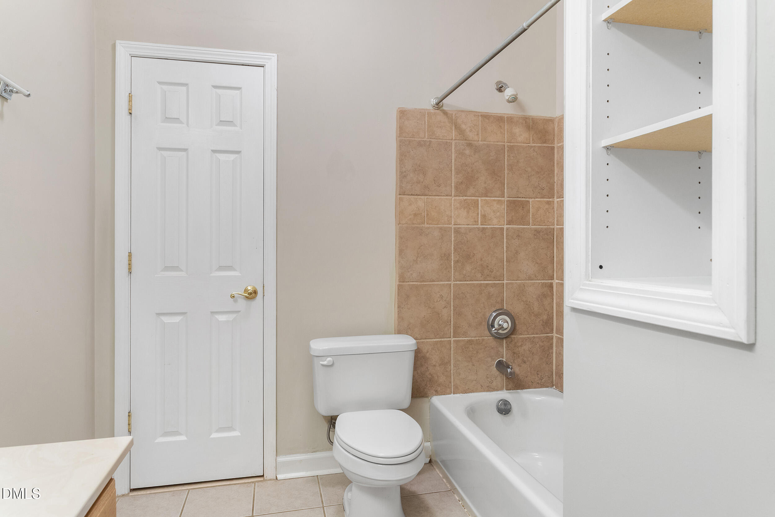 4724 Ludwell Branch Court Raleigh, NC 27612 - Photo 44 of 72 a bathroom with a toilet and a shower