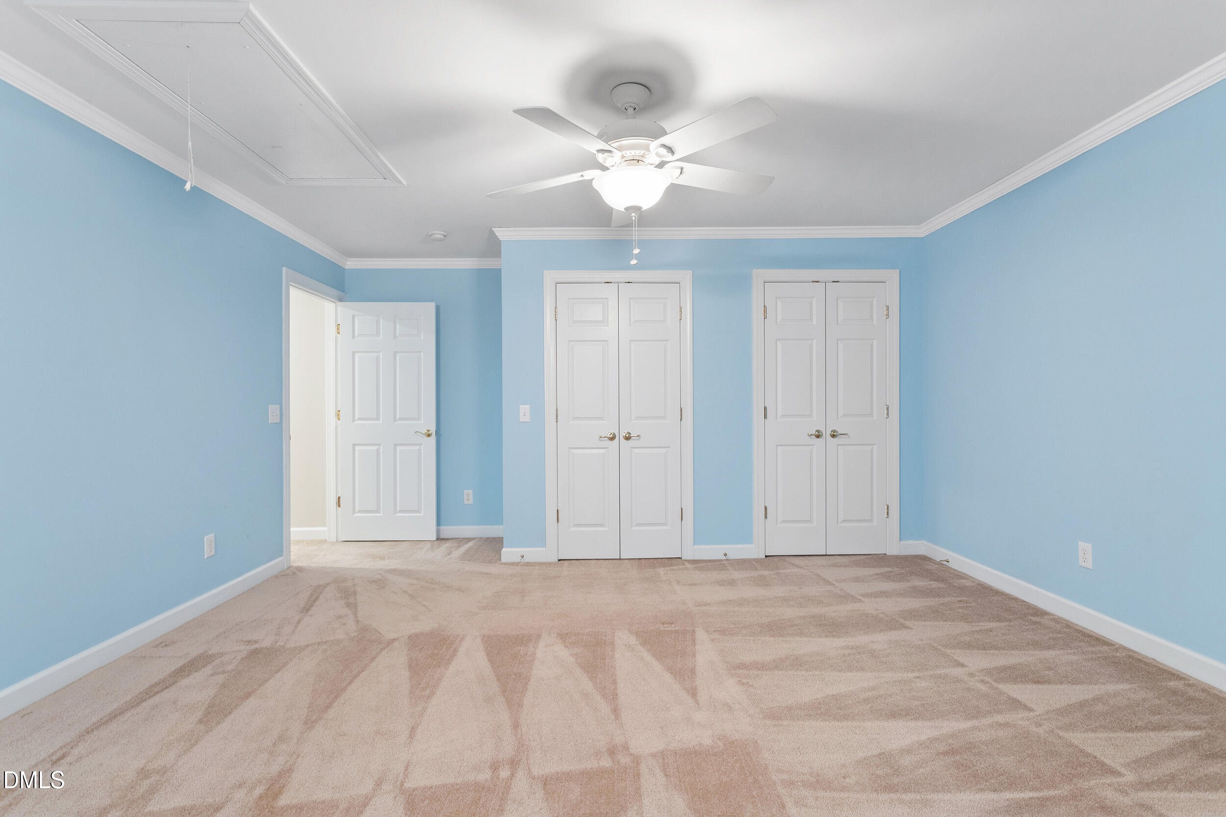 4724 Ludwell Branch Court Raleigh, NC 27612 - Photo 51 of 72 a view of a room with a ceiling fan
