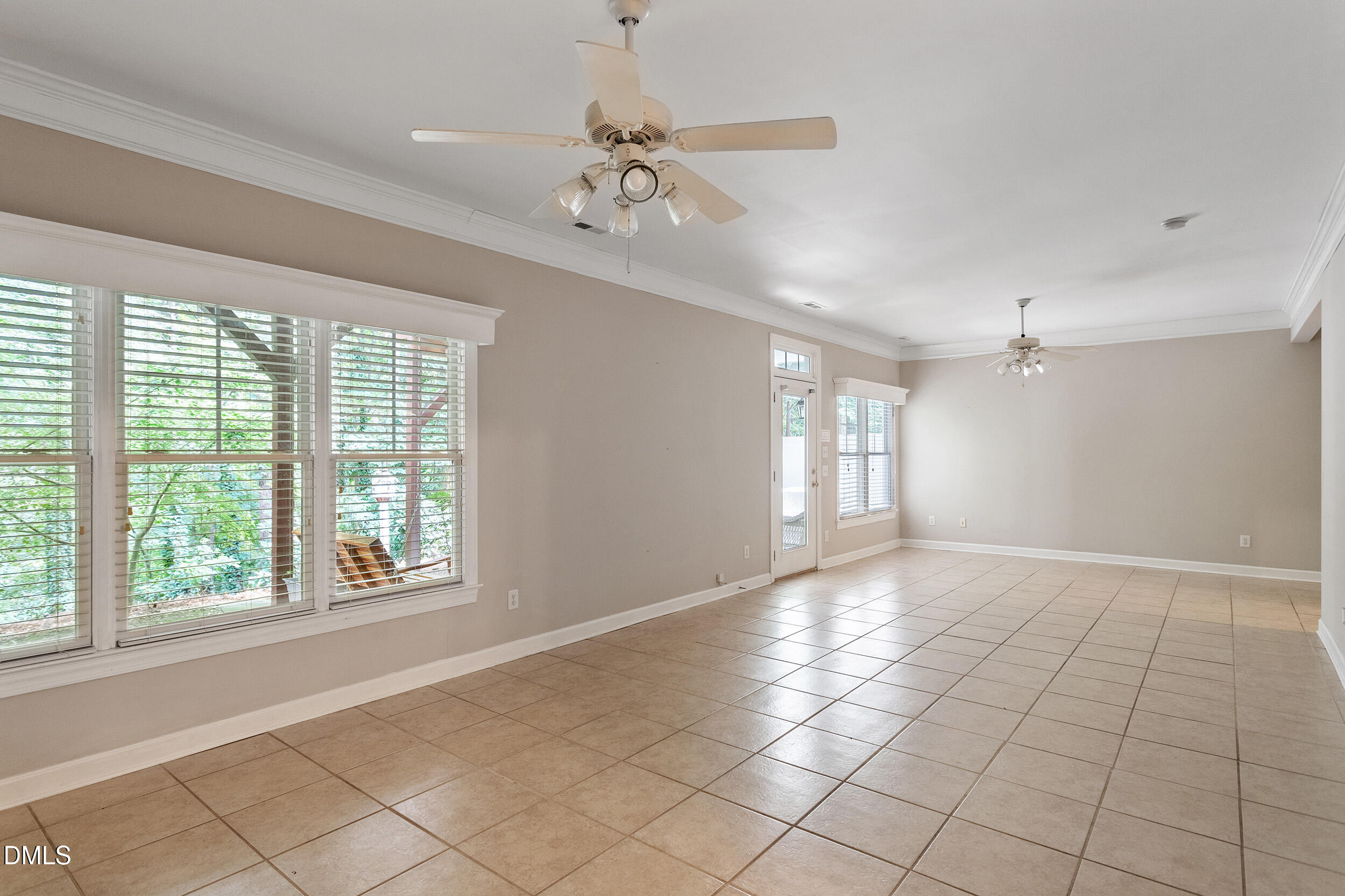 4724 Ludwell Branch Court Raleigh, NC 27612 - Photo 62 of 72 a view of an empty room with a window