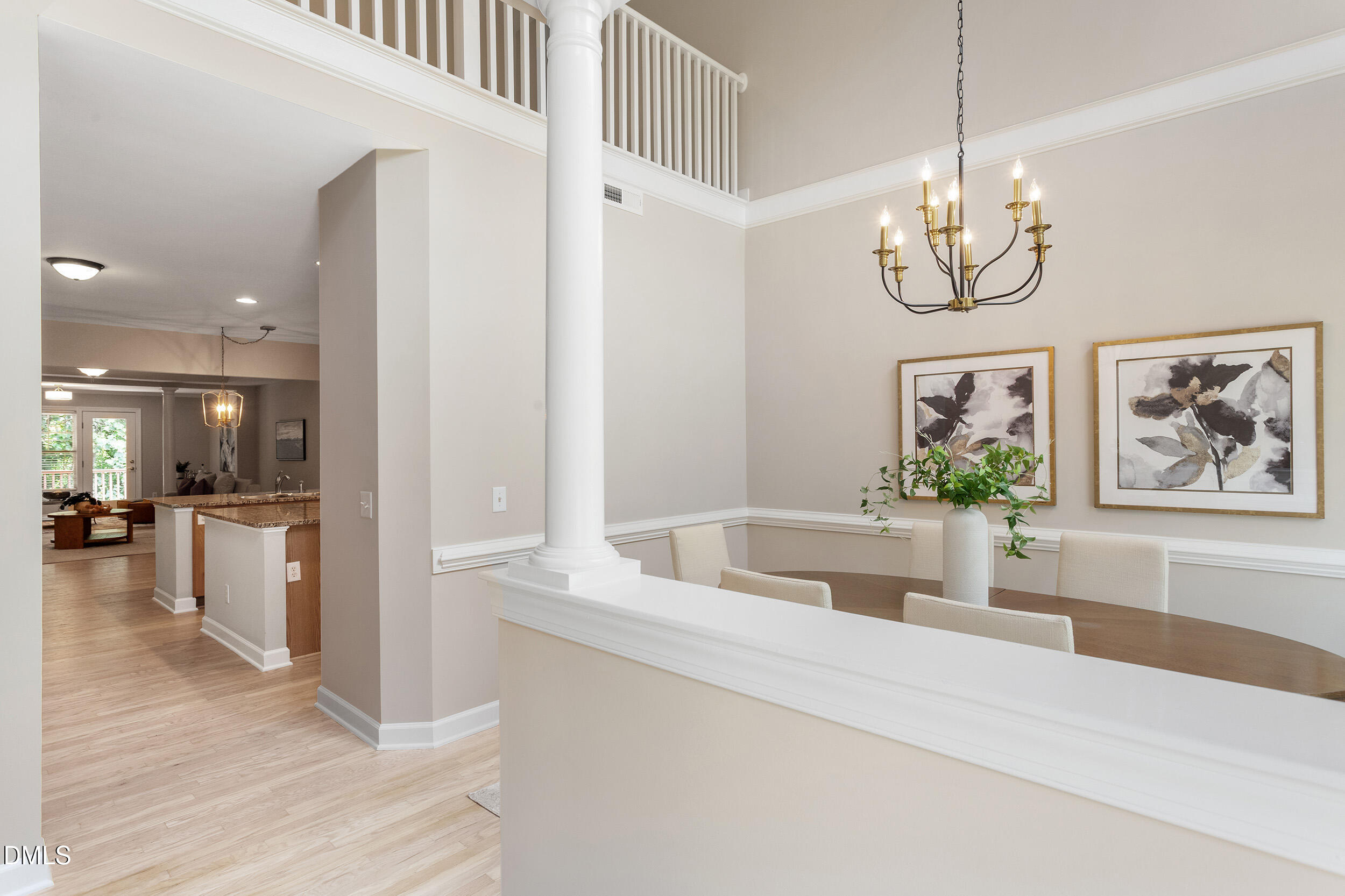 4724 Ludwell Branch Court Raleigh, NC 27612 - Photo 6 of 72 a view of living room kitchen and dining room