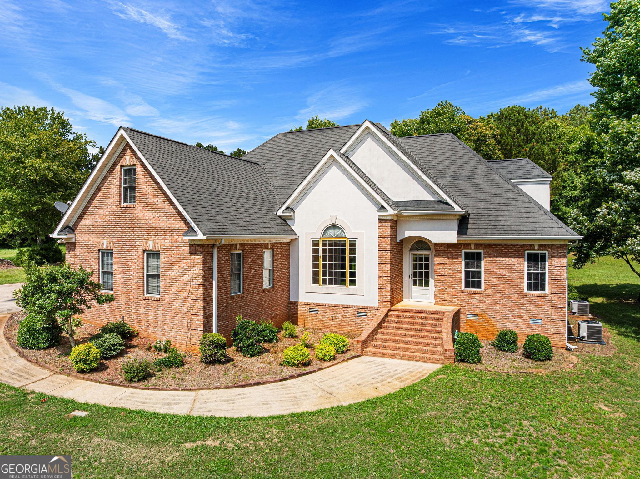 1400 Brush Creek Road Colbert, GA 30628 - Photo 1 of 1 a view of a house with a yard