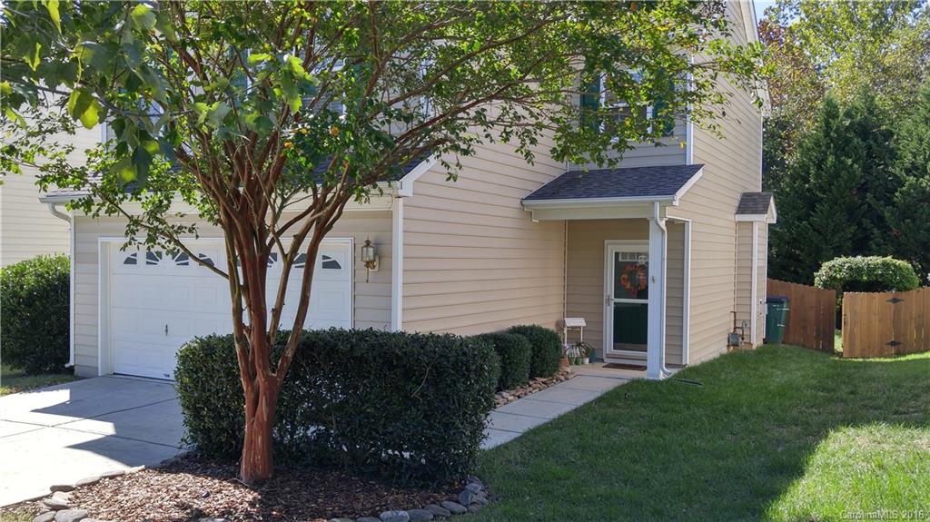 3908 Caliper Place, Unit 325 Fort Mill, SC 29708 - Photo 2 of 24 a view of a house with backyard and a tree