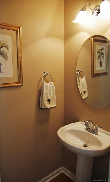3908 Caliper Place, Unit 325 Fort Mill, SC 29708 - Photo 12 of 24 a bathroom with a sink mirror and toilet
