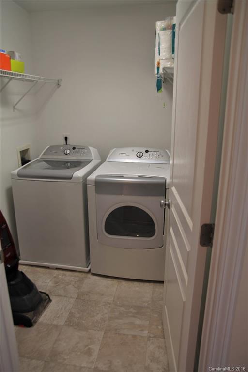 3908 Caliper Place, Unit 325 Fort Mill, SC 29708 - Photo 18 of 24 a utility room with dryer and washer