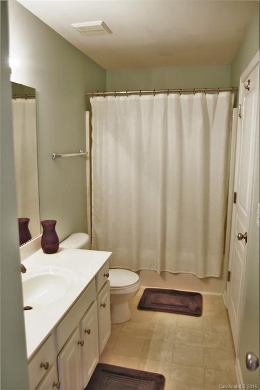 3908 Caliper Place, Unit 325 Fort Mill, SC 29708 - Photo 21 of 24 a bathroom with a sink and a mirror