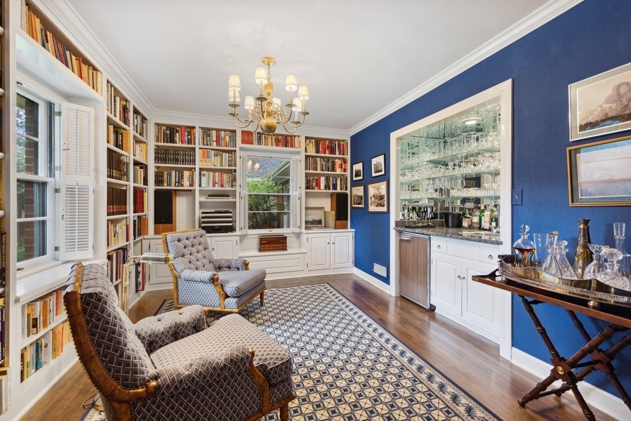 321 Oak Brook Road Oak Brook, IL 60523 - Photo 11 of 40 a living room with furniture and a chandelier