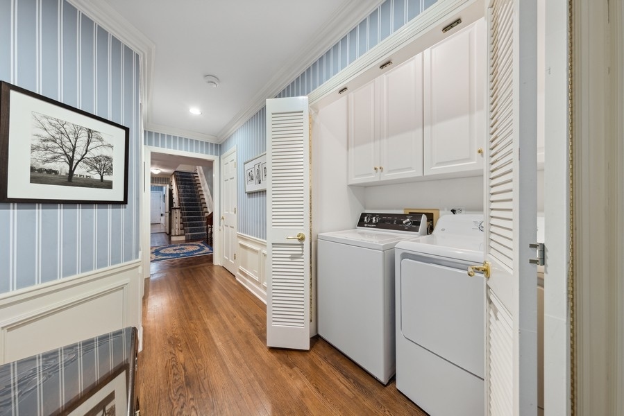 321 Oak Brook Road Oak Brook, IL 60523 - Photo 18 of 40 a view of kitchen with refrigerator and wooden floor