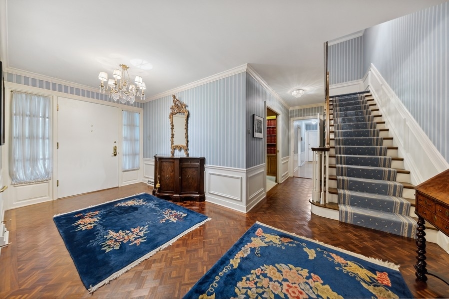321 Oak Brook Road Oak Brook, IL 60523 - Photo 25 of 40 a living room with furniture rug and wooden floor