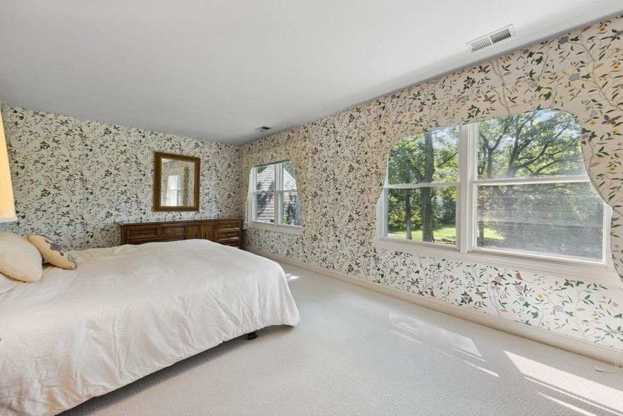 321 Oak Brook Road Oak Brook, IL 60523 - Photo 27 of 40 a bedroom with a bed and a window