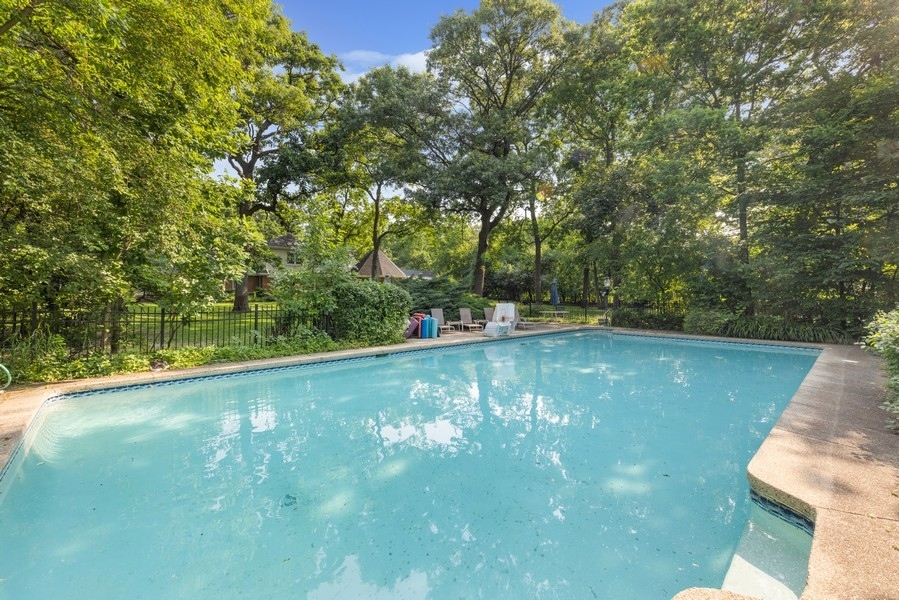 321 Oak Brook Road Oak Brook, IL 60523 - Photo 32 of 40 a view of a lake with a yard