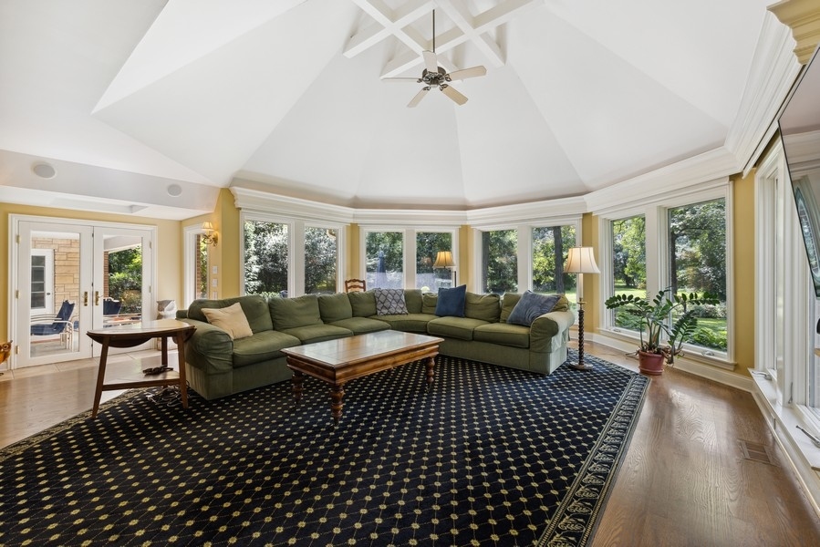 321 Oak Brook Road Oak Brook, IL 60523 - Photo 5 of 40 a living room with furniture and a table