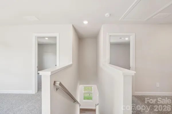 a view of a hallway with entryway