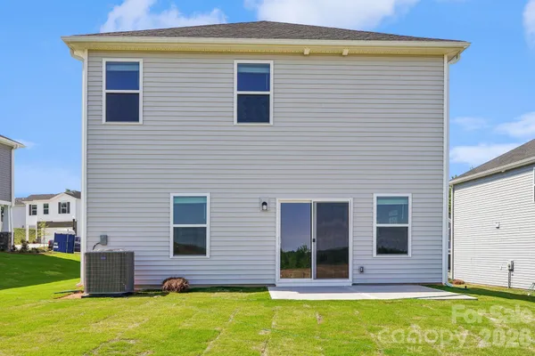 a view of house with outdoor space