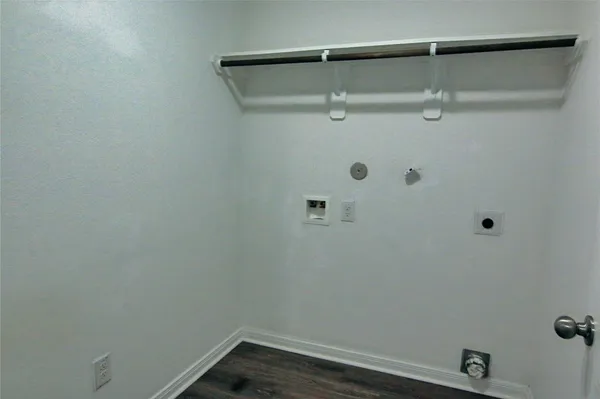 a kitchen with stainless steel appliances wooden cabinets and granite counter tops