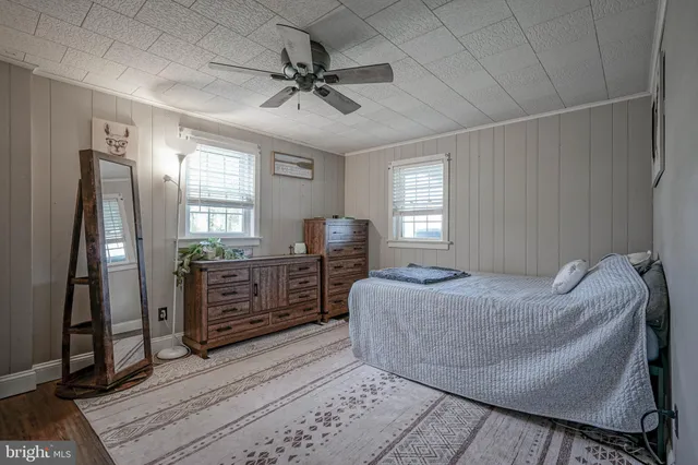 a bed room with a bed and furniture