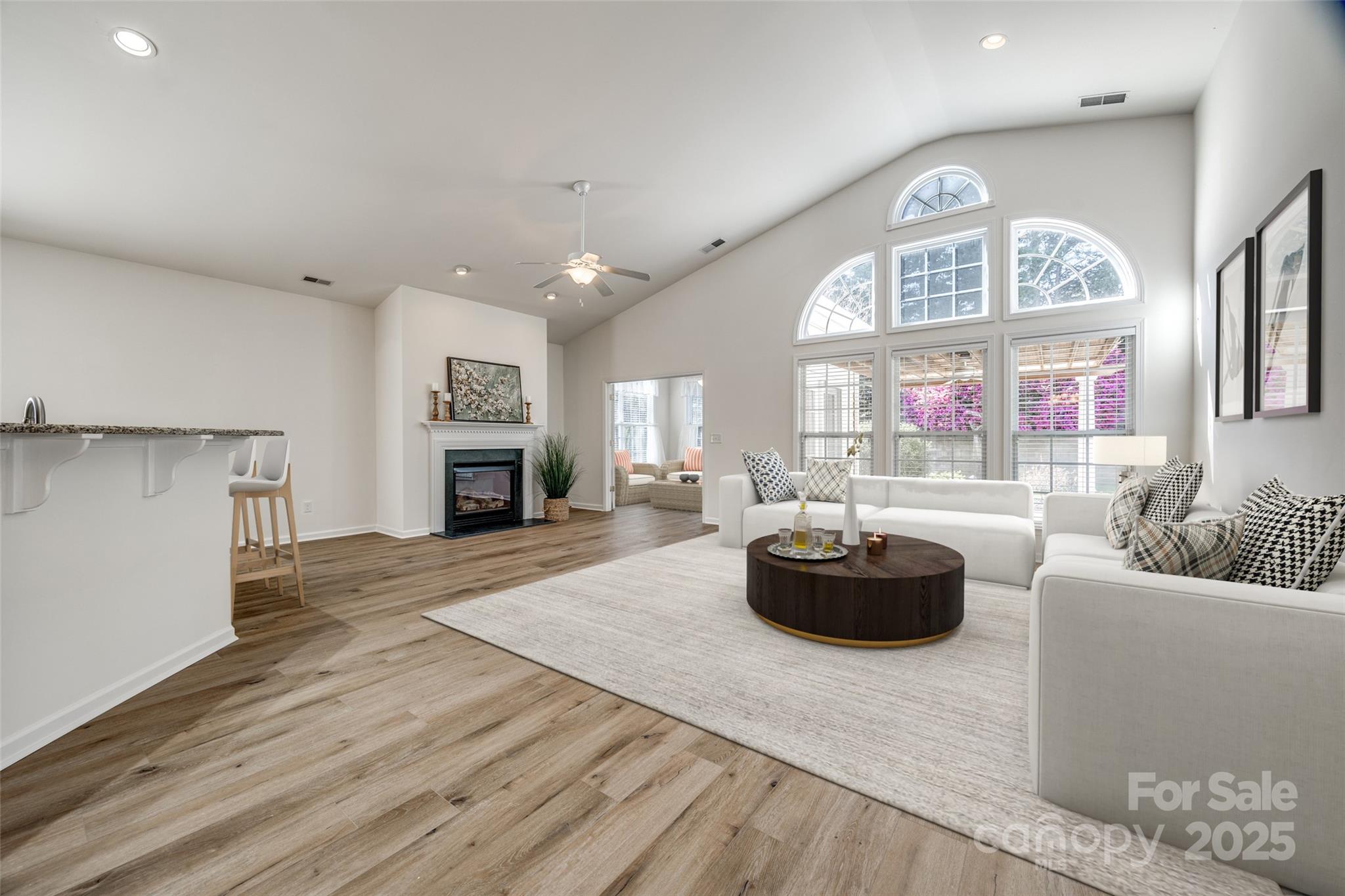 974 Platinum Drive Fort Mill, SC 29708 - Photo 11 of 48 a living room with fireplace furniture and a large window