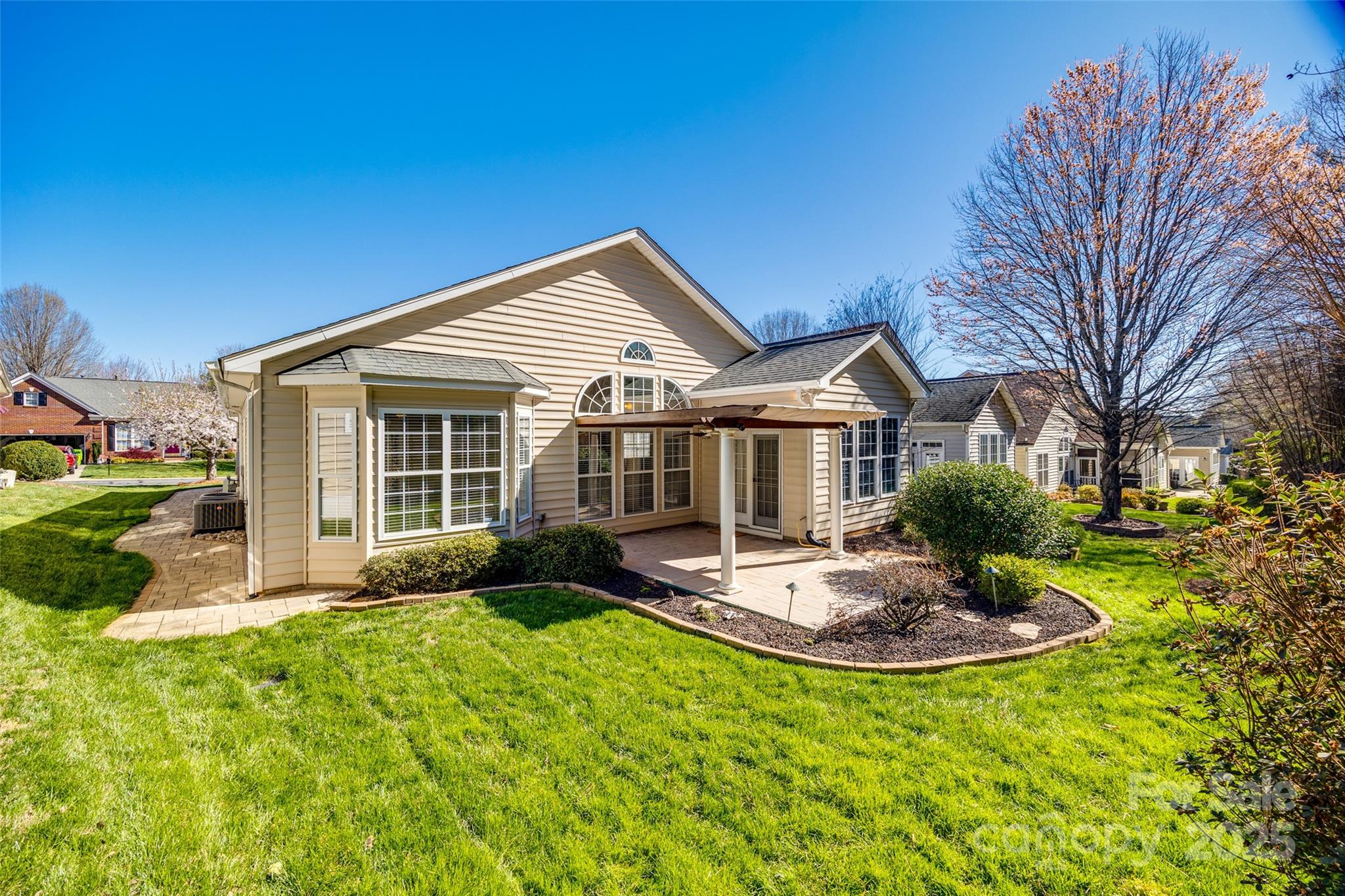 974 Platinum Drive Fort Mill, SC 29708 - Photo 4 of 48 a front view of a house with a yard table and chairs