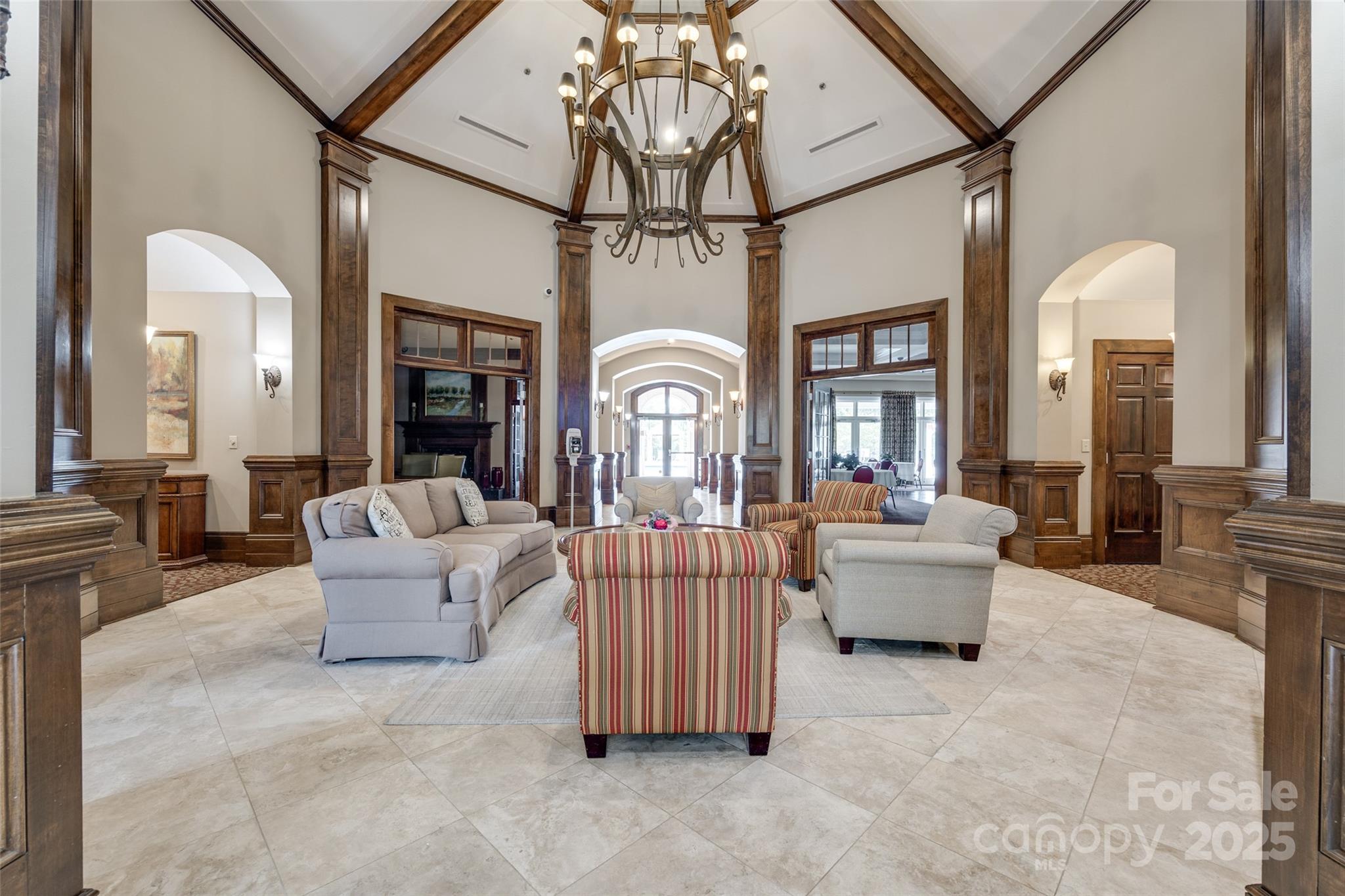 974 Platinum Drive Fort Mill, SC 29708 - Photo 43 of 48 a living room with fireplace furniture and a chandelier