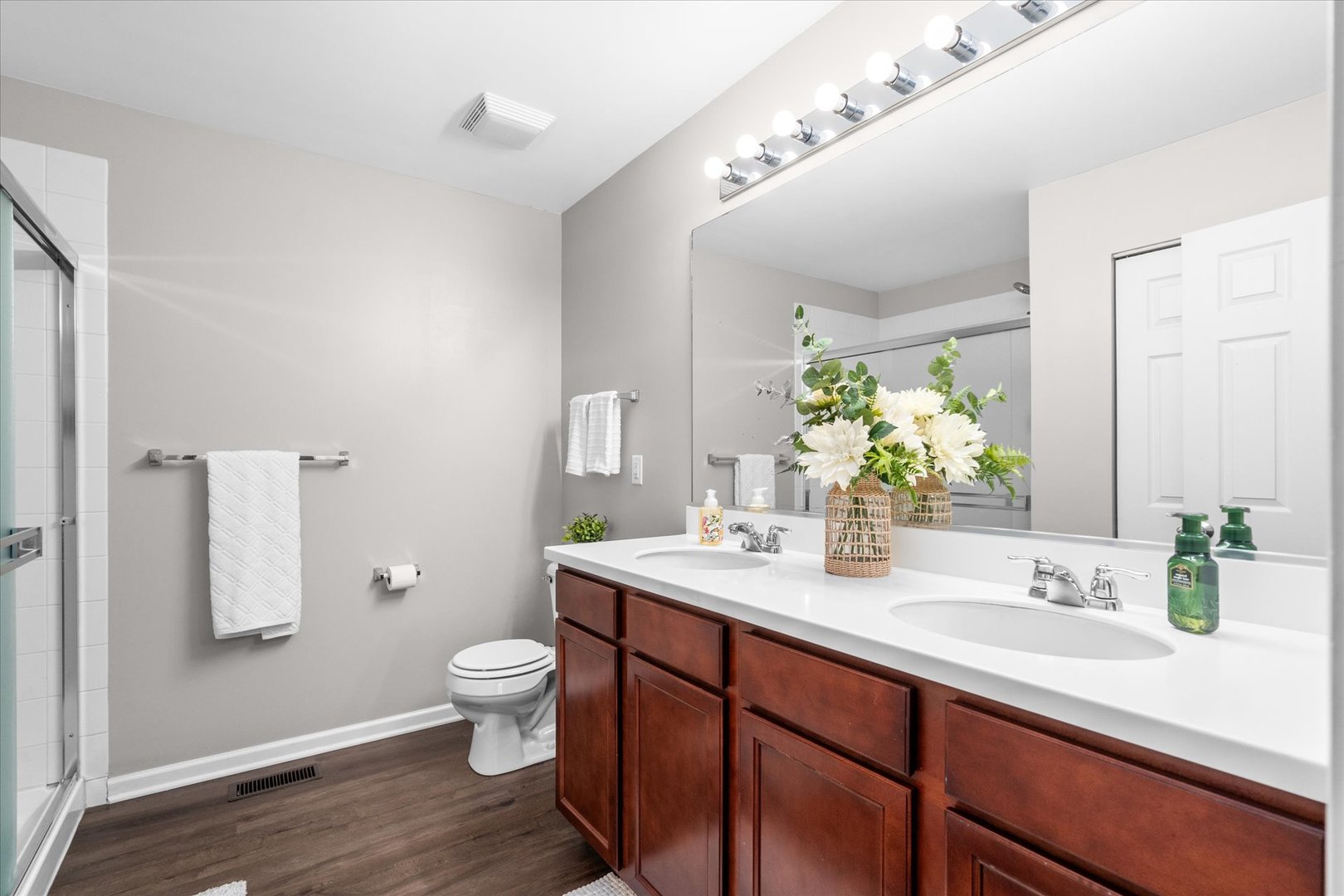 278 Windett Ridge Road Yorkville, IL 60560 - Photo 19 of 31 a bathroom with a sink a toilet and a mirror